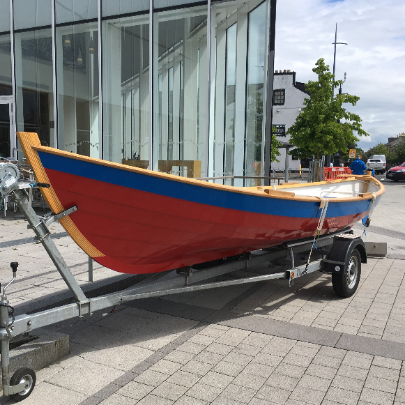 Skiff on display outside The Portal in Irvine