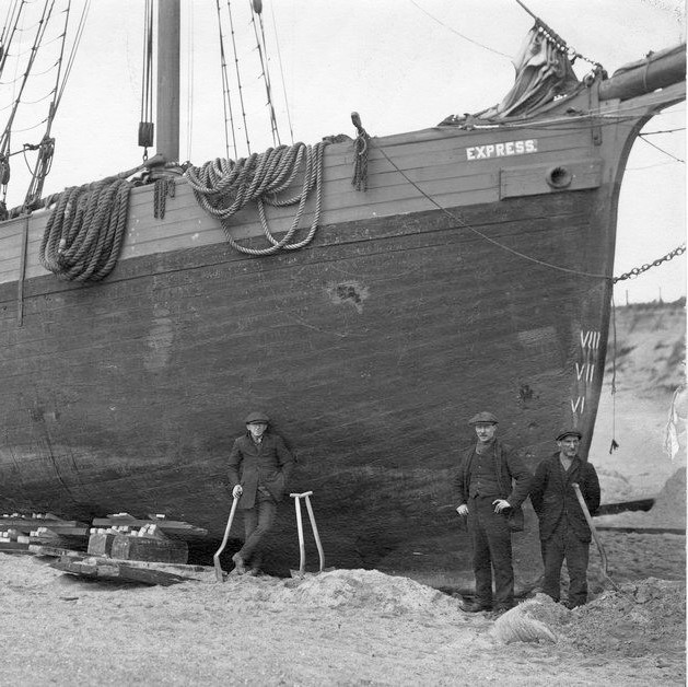 Close up of starboard side of Coastal Ketch Express aground at Irvine